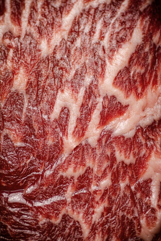Marmoriertes rotes Fleisch, detailreich.